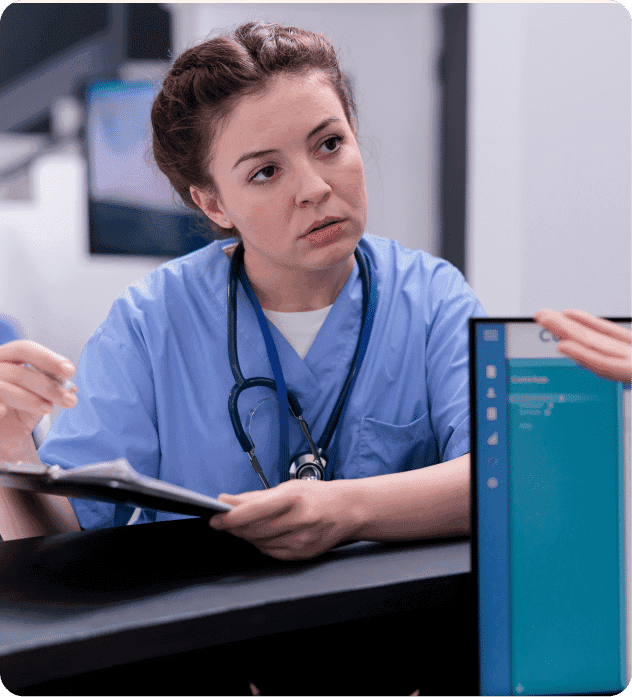 Nurse Reviewing Chart